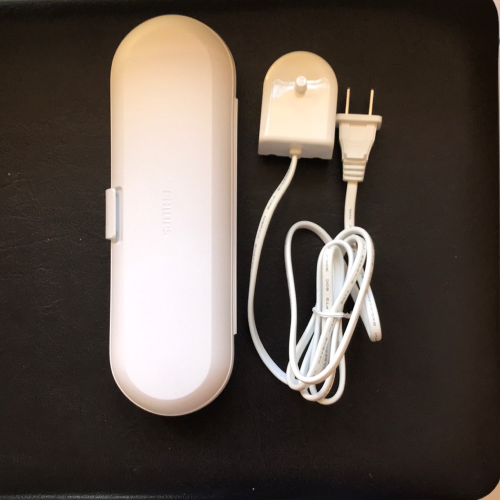 Phillips electric toothbrush charger and hard carrying case